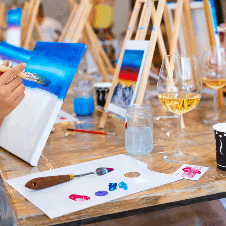 Couple painting at Painting With a Twist, one of the best date night activities in Jacksonville