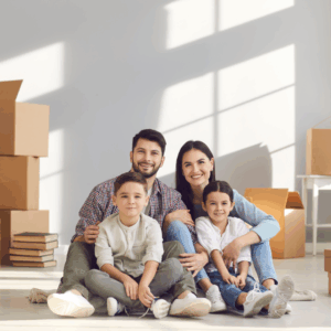 Family relocating to Northeast Florida with moving boxes
