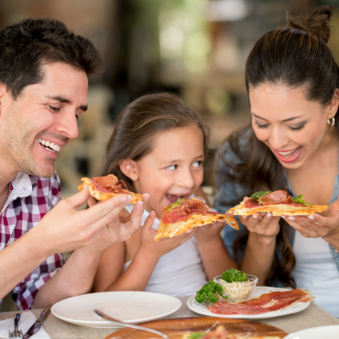 Family enjoying dinner together at one of the best family friendly restaurants in Northeast Florida