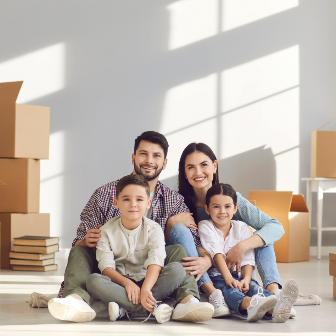 relocating to NE Florida Family relocating to Northeast Florida with moving boxes